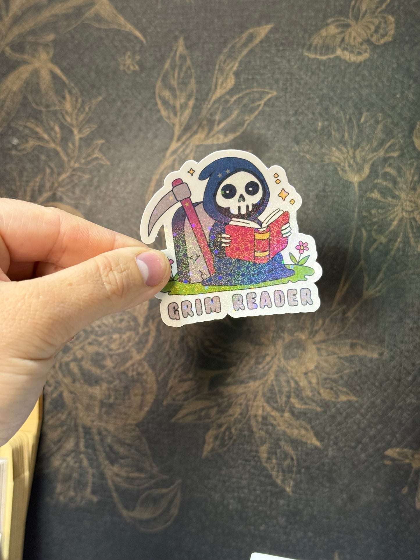 Grim reader sticker