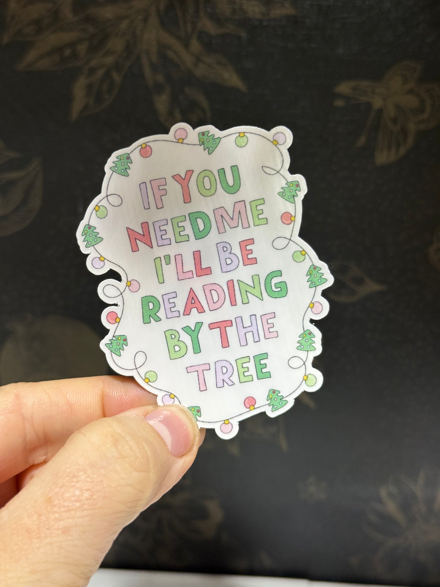 Reading by the tree sticker
