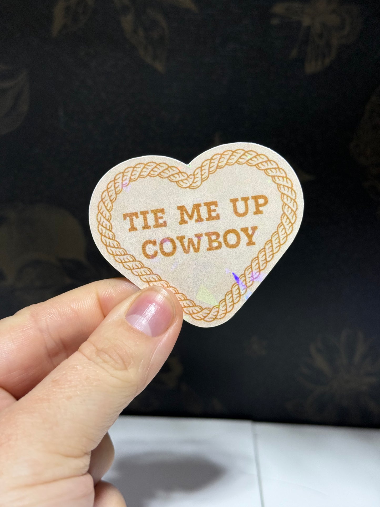 Tie me up sticker